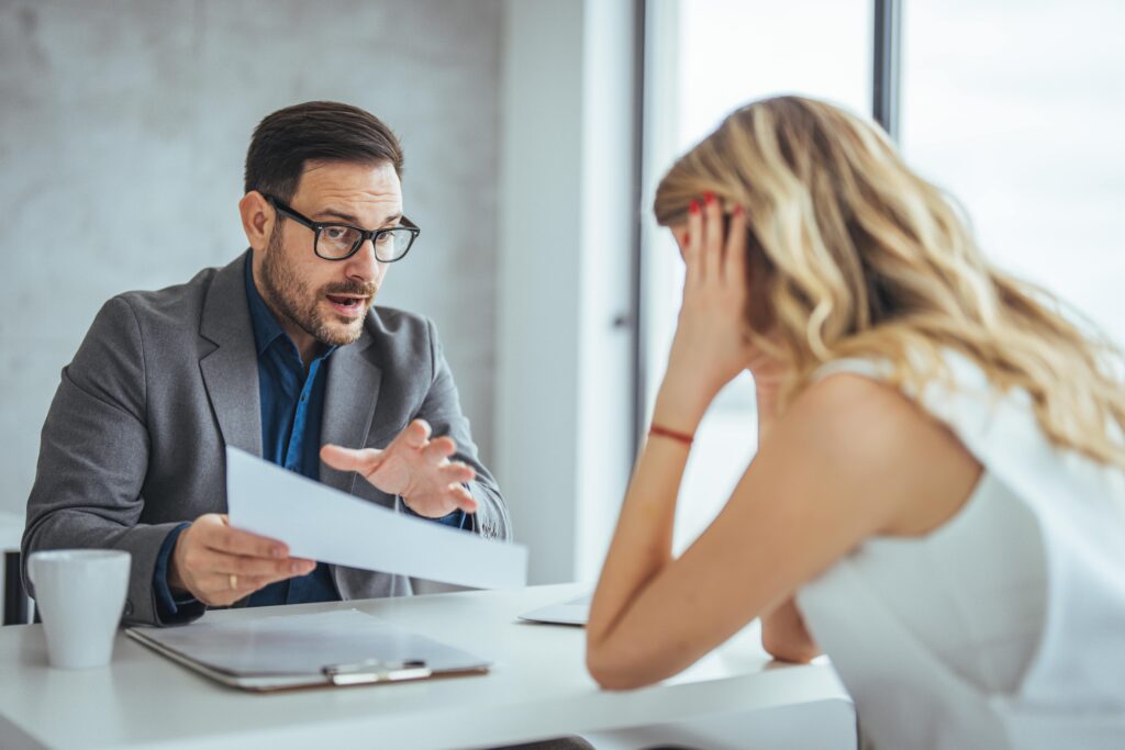 female employee in disciplinary meeting after investigation