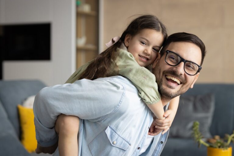 child playing with father