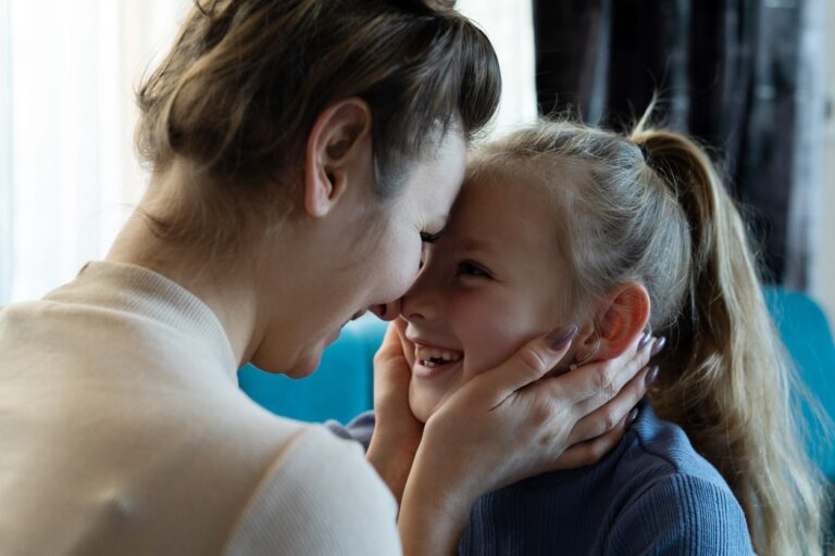 mother and daughter having loving moment